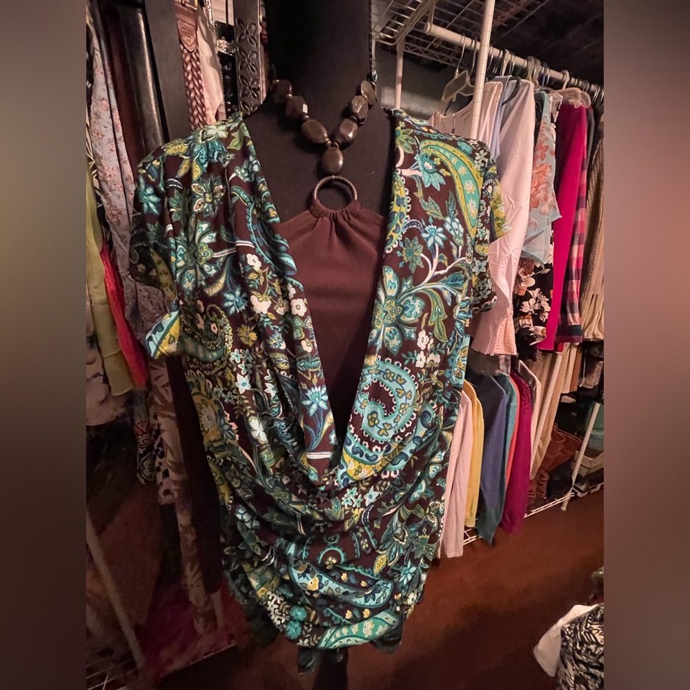 Sexy Blouse in floral print with brown tie around neck.